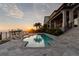 Relaxing pool area overlooking the water at sunset at 5120 W Longfellow Ave, Tampa, FL 33629