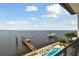 Stunning waterfront view with private dock and pool at 5120 W Longfellow Ave, Tampa, FL 33629