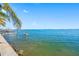 Serene waterfront view with boat dock at 600 55Th Ave, St Pete Beach, FL 33706