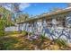 Rear view of a house with a fenced yard at 602 33Rd Street W Ct, Bradenton, FL 34205