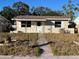 Single story home with a small front yard at 637 64Th S Ave, St Petersburg, FL 33705