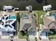 Aerial view of the property and surrounding canal at 706 Eagle Ln, Apollo Beach, FL 33572