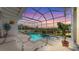 Enclosed pool and spa with sunset view at 706 Eagle Ln, Apollo Beach, FL 33572