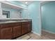 Bathroom with double vanity and granite countertop at 9626 Channing Hill Dr, Ruskin, FL 33573