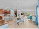 Bright dining area adjacent to a well-equipped kitchen at 9626 Channing Hill Dr, Ruskin, FL 33573