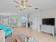 Open living room with a view of the kitchen and dining area at 9626 Channing Hill Dr, Ruskin, FL 33573