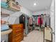 Large walk-in closet with ample shelving and hanging space at 9626 Channing Hill Dr, Ruskin, FL 33573