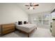 Main bedroom with carpeted floor, large windows, and ample space at 10334 Estero Bay Ln, Tampa, FL 33625