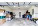 Garage with overhead door and ample storage space at 1105 Savannah Landings Ave, Valrico, FL 33596