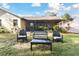 Spacious backyard with patio, providing ample space for outdoor enjoyment at 1121 Belladonna Dr, Brandon, FL 33510
