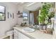 Clean bathroom with a single sink vanity and a shower at 1121 Belladonna Dr, Brandon, FL 33510