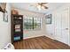 Simple bedroom with a bookshelf and wood floors at 1121 Belladonna Dr, Brandon, FL 33510