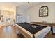 Pool table in a game room with hardwood floors at 1121 Belladonna Dr, Brandon, FL 33510