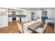Open concept dining area with kitchen and living room views at 1201 Kapok Cir, Clearwater, FL 33759