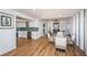 Bright dining area with a wood table and chairs, adjacent to the kitchen at 1201 Kapok Cir, Clearwater, FL 33759