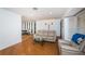 Spacious living area with hardwood floors and natural light at 1201 Kapok Cir, Clearwater, FL 33759