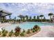 Resort-style pool with lounge chairs and landscaping at 12218 54Th E St, Parrish, FL 34219