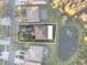 Aerial view highlighting the property lines and surrounding pond at 18127 Sandy Pointe Dr, Tampa, FL 33647