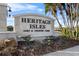 Elegant entrance sign for Heritage Isles Golf & Country Club at 18127 Sandy Pointe Dr, Tampa, FL 33647