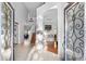 Two-story entryway with an open staircase and hardwood floors at 18127 Sandy Pointe Dr, Tampa, FL 33647