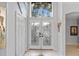Front entry with double doors and tiled floors at 18127 Sandy Pointe Dr, Tampa, FL 33647