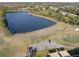 Expansive golf course with a lake, driving range, and putting green, offering golfers a variety of practice and play options at 18127 Sandy Pointe Dr, Tampa, FL 33647