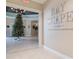 View of lobby with Christmas tree and sign for the Bay Scape Bar at Heritage Isles Golf & Country Club at 18127 Sandy Pointe Dr, Tampa, FL 33647
