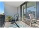 Private balcony with seating area and city views at 201 W Laurel St # 503, Tampa, FL 33602