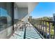 Relaxing balcony with patio furniture and city views at 201 W Laurel St # 503, Tampa, FL 33602