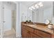 Bathroom boasts granite countertop, large vanity, and shower at 201 W Laurel St # 503, Tampa, FL 33602