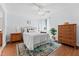 Comfortable bedroom with a queen-size bed and hardwood floors at 201 W Laurel St # 503, Tampa, FL 33602