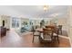 Bright dining room with wood floors and a mirrored wall at 201 W Laurel St # 503, Tampa, FL 33602