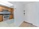 View of entryway and kitchen with stainless steel appliances at 201 W Laurel St # 503, Tampa, FL 33602