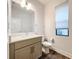 Clean bathroom with quartz countertop vanity and modern fixtures at 2511 N Grady N Ave # 59, Tampa, FL 33607