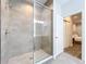 Modern bathroom with a walk-in shower and double vanity at 2511 N Grady N Ave # 59, Tampa, FL 33607