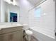 Modern bathroom with soaking tub, toilet and vanity with double sinks at 2511 N Grady N Ave # 59, Tampa, FL 33607