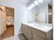 Double vanity bathroom with a view of a bedroom at 2511 N Grady N Ave # 59, Tampa, FL 33607
