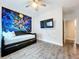 Spacious bedroom with wood flooring and a daybed at 2511 N Grady N Ave # 59, Tampa, FL 33607