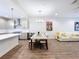Open concept dining area with modern light fixtures at 2511 N Grady N Ave # 59, Tampa, FL 33607
