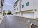 Attached garage with ample parking space at 2511 N Grady N Ave # 59, Tampa, FL 33607