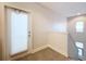 Upper hallway with a door and window coverings at 2511 N Grady N Ave # 59, Tampa, FL 33607