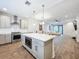 Modern kitchen with large island and stainless steel appliances at 2511 N Grady N Ave # 59, Tampa, FL 33607