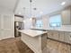 Modern kitchen with stainless steel appliances and island at 2511 N Grady N Ave # 59, Tampa, FL 33607