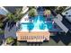Community pool with spacious deck and lounge chairs at 2511 N Grady N Ave # 59, Tampa, FL 33607