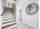 Modern staircase with wood steps and dark metal railing at 2511 N Grady N Ave # 59, Tampa, FL 33607