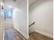 Modern staircase with wood flooring and a neutral color palette at 2511 N Grady N Ave # 59, Tampa, FL 33607