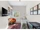 Bright office features hardwood floors, large windows, custom bookshelf and neutral paint at 340 1St N St # I, St Petersburg, FL 33701