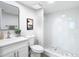 Updated bathroom with white vanity and walk-in shower at 400 Island Way # 1411, Clearwater Beach, FL 33767