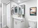 Modern bathroom with white vanity, new fixtures, and stylish decor at 400 Island Way # 1411, Clearwater Beach, FL 33767