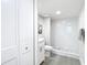 Modern bathroom with walk-in shower and pebble flooring at 400 Island Way # 1411, Clearwater Beach, FL 33767
